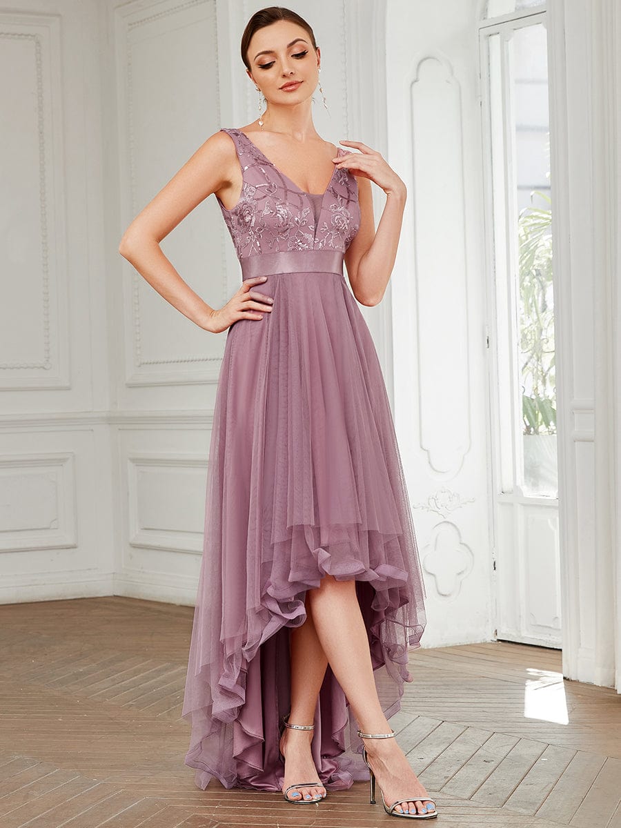 Olive green high-low tulle prom dress with sequin appliques.