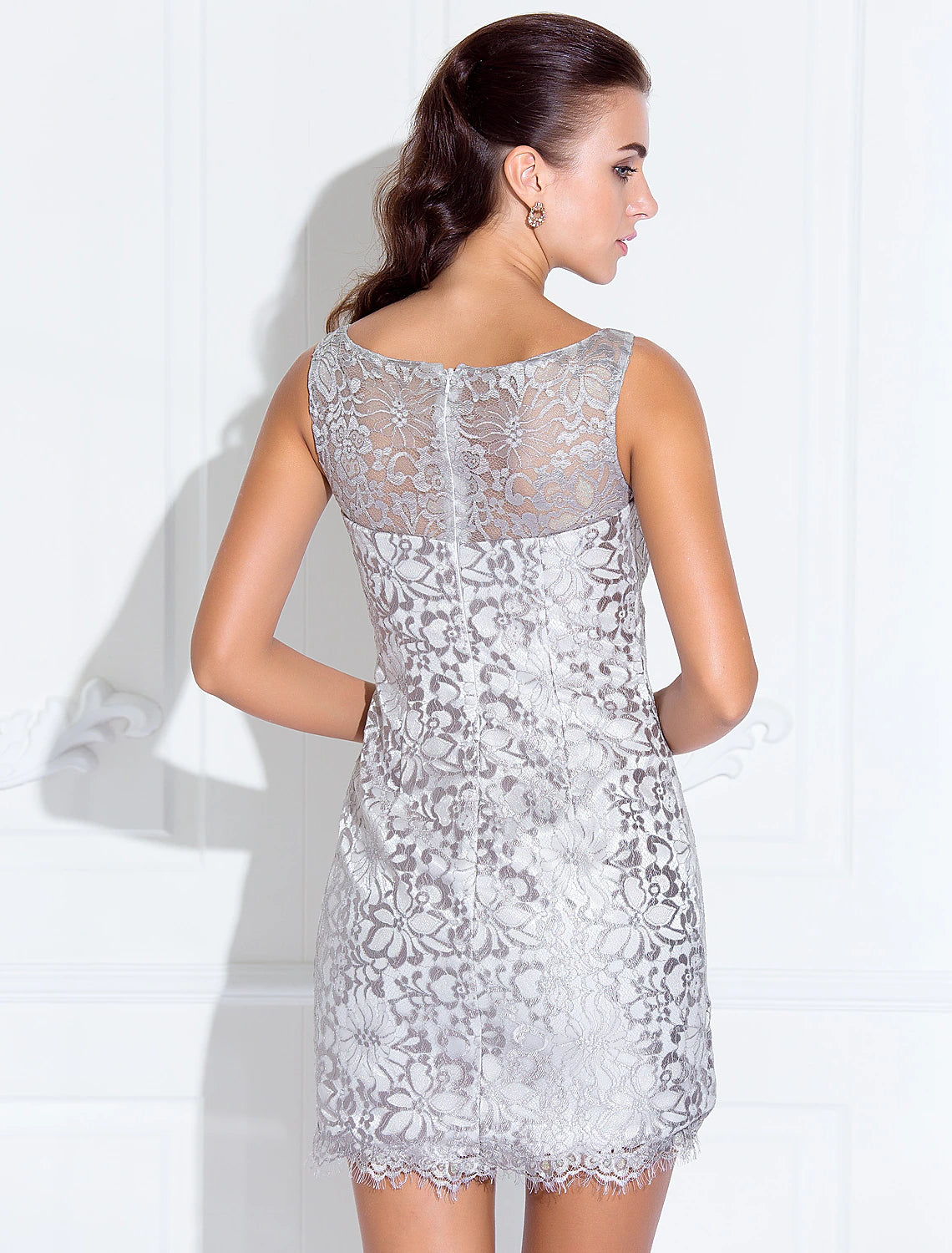 Woman posing in the Weitese elegant dress, full length view.