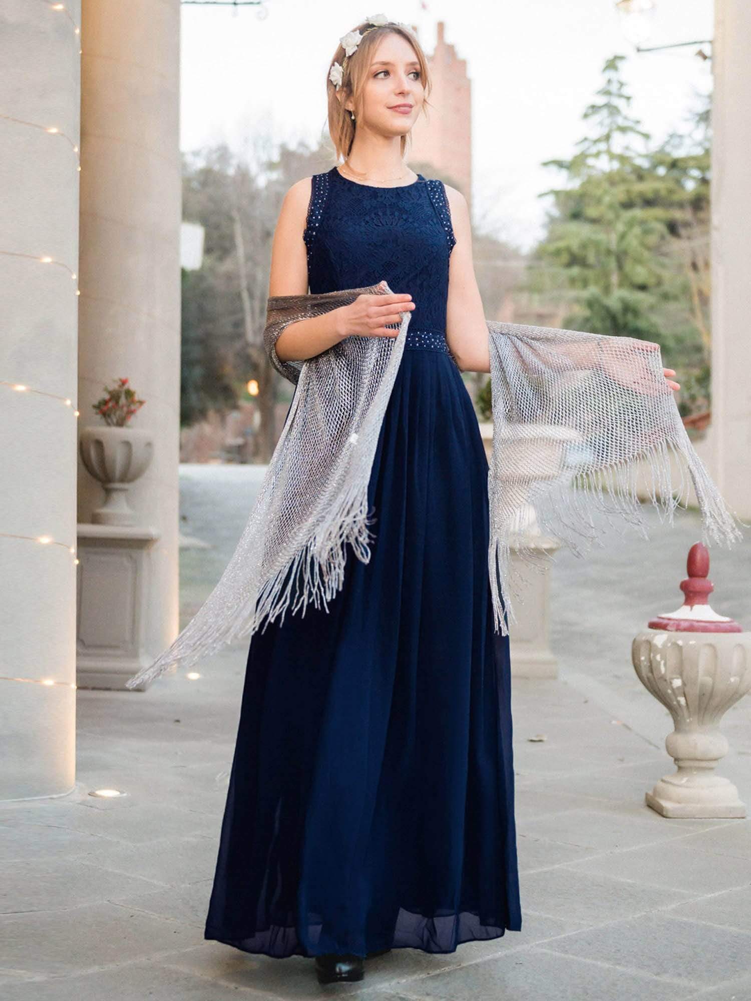 Model wearing a light blue Weitese sleeveless lace bodice empire waist A-line bridesmaid dress.