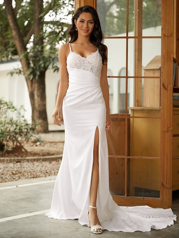 Bride wearing a Weitese elegant lace sheath column V-neck wedding dress.