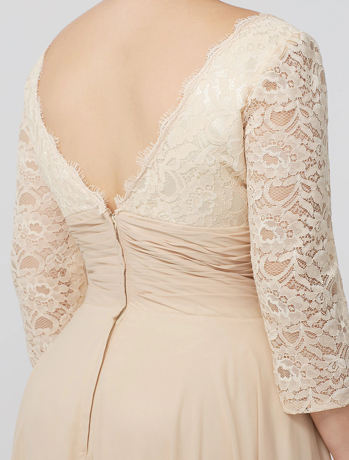 Close-up of the bodice and sleeve detail of the light blue dress.