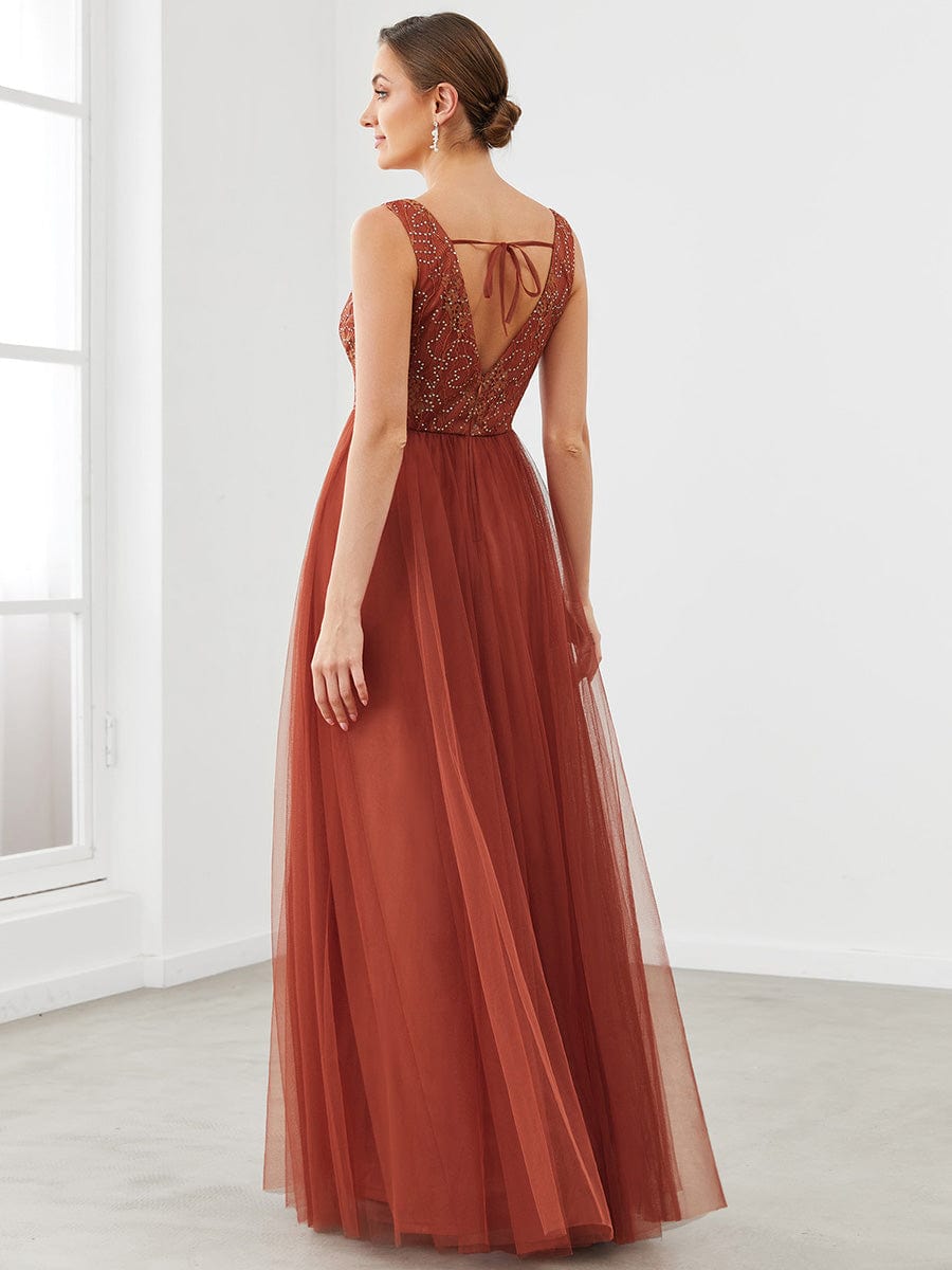 Side view of the A-line V-neck tulle bridesmaid dress, showcasing its flowing skirt.