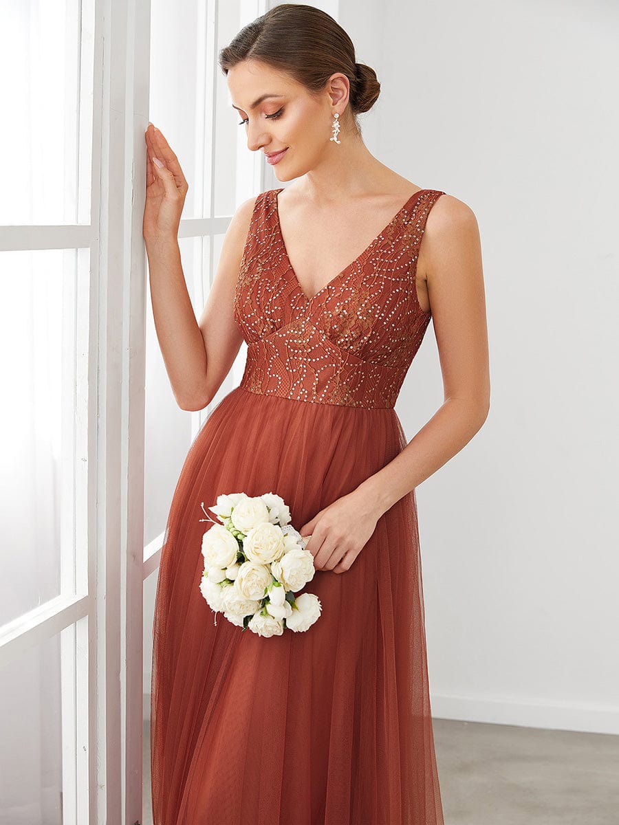 Back view of the elegant V-neck tulle bridesmaid dress with a graceful silhouette.
