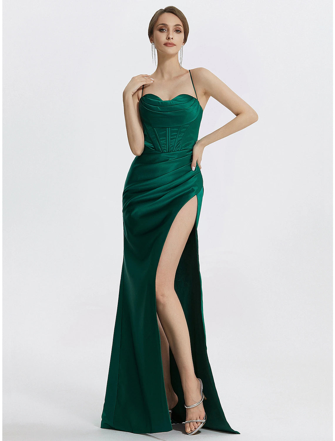 Elegant black mermaid prom dress with a cowl neck and ruched slit.