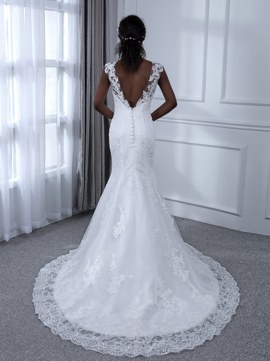 Back view of Weitese mermaid wedding dress, showing tulle train and appliques.