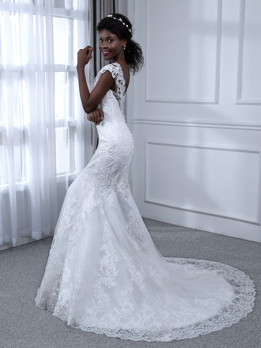 Close-up of appliques on the Weitese tulle mermaid wedding dress.