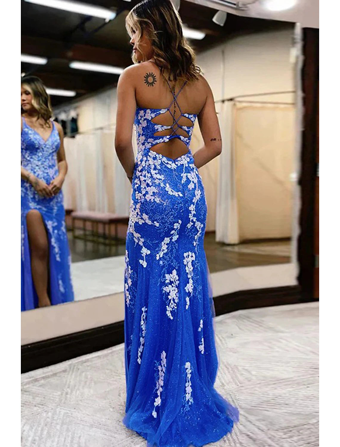Back view of Weitese Mermaid Trumpet Prom Dress, showcasing open back and sweep train.