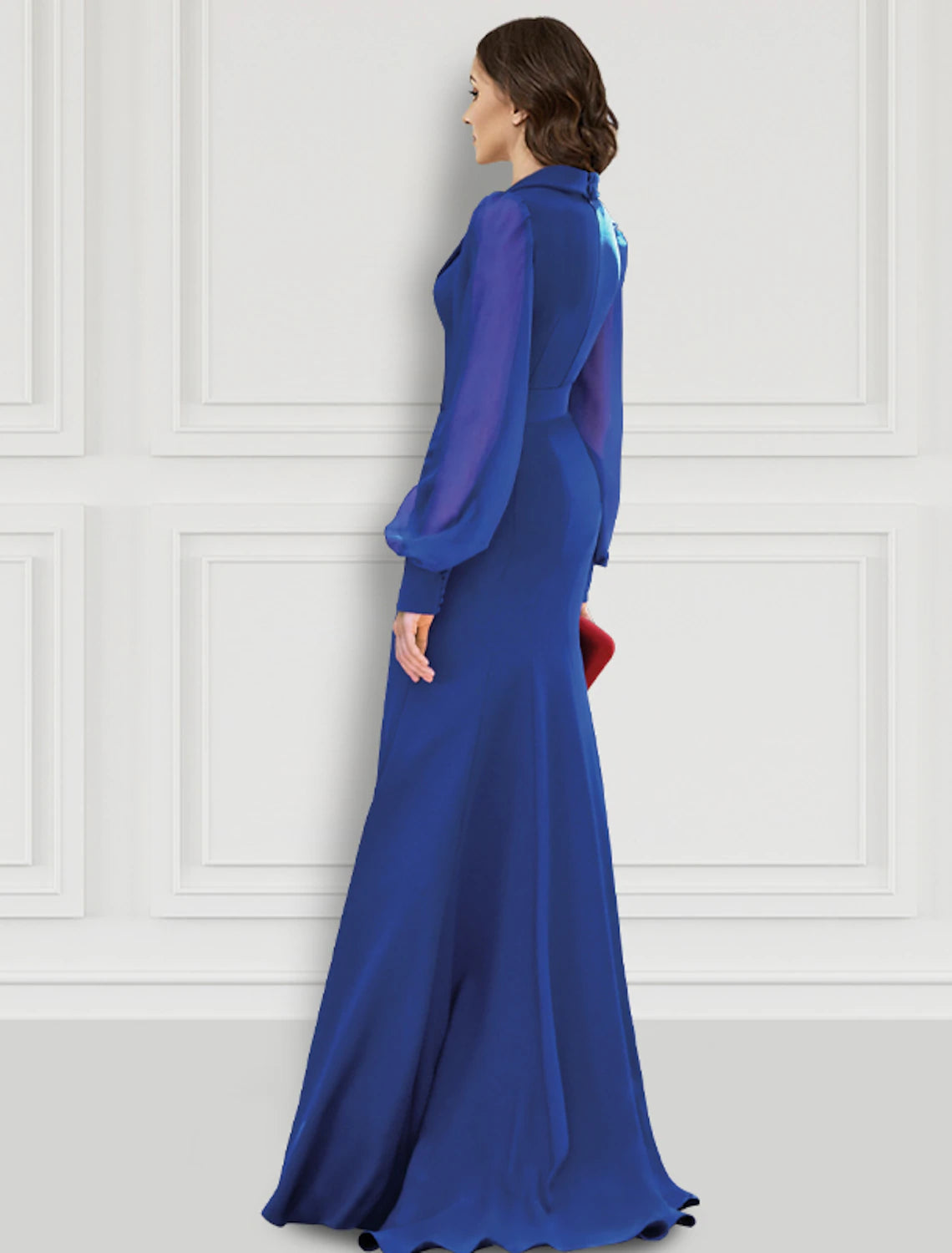 Full-length view of a woman in a dark mermaid formal dress with long sleeves, V-neck, and button details.