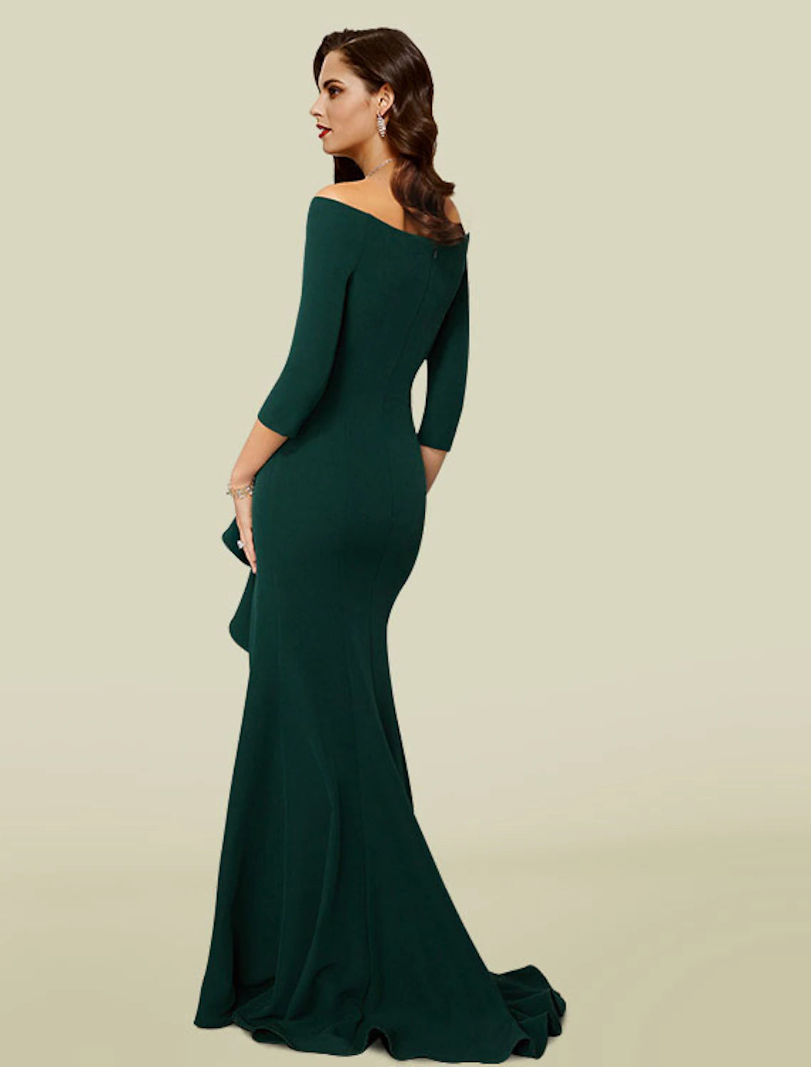 Back view of an elegant off-shoulder V-neck mermaid trumpet gown with a court train.
