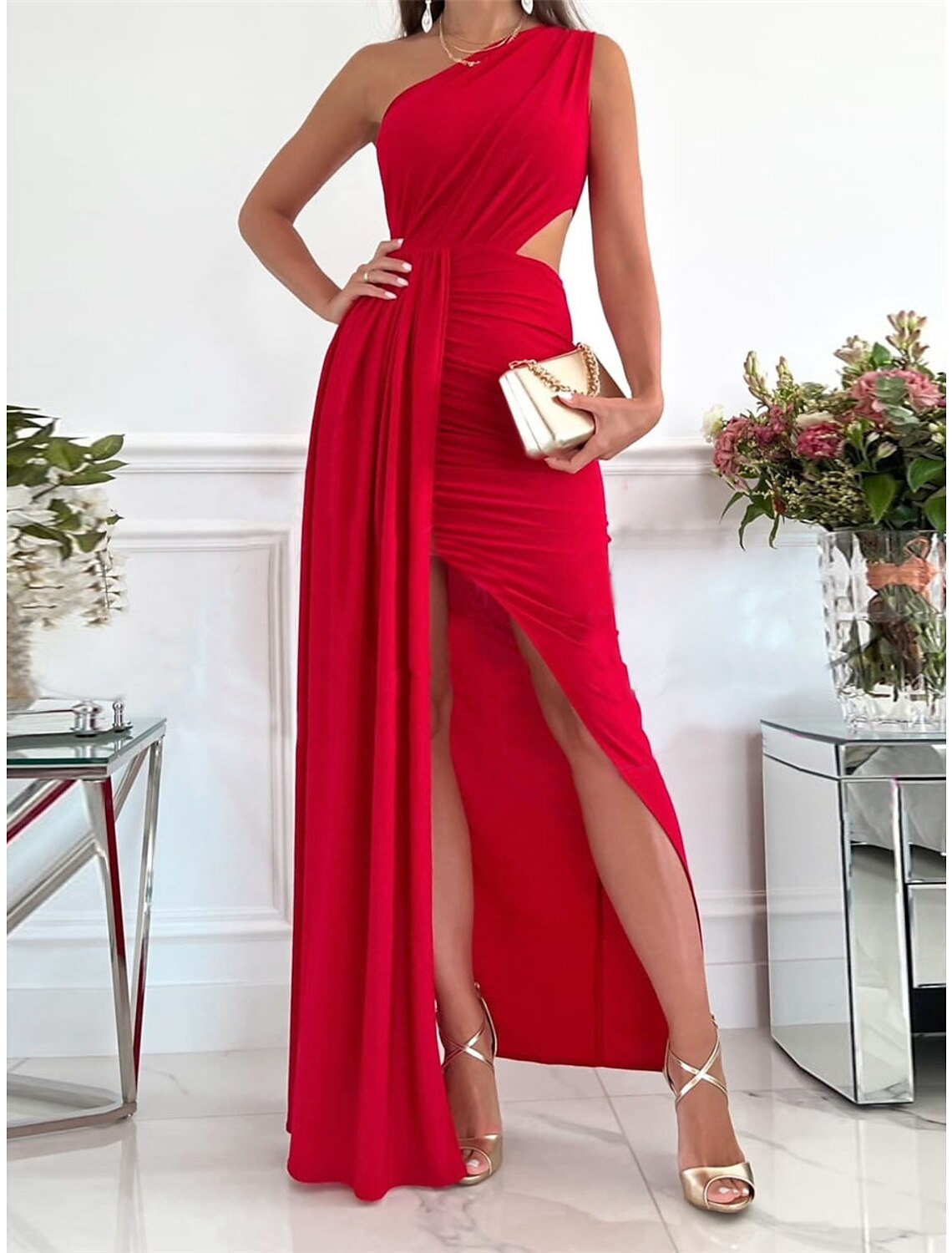 Back view of a woman in a red Weitese one-shoulder backless maxi dress.