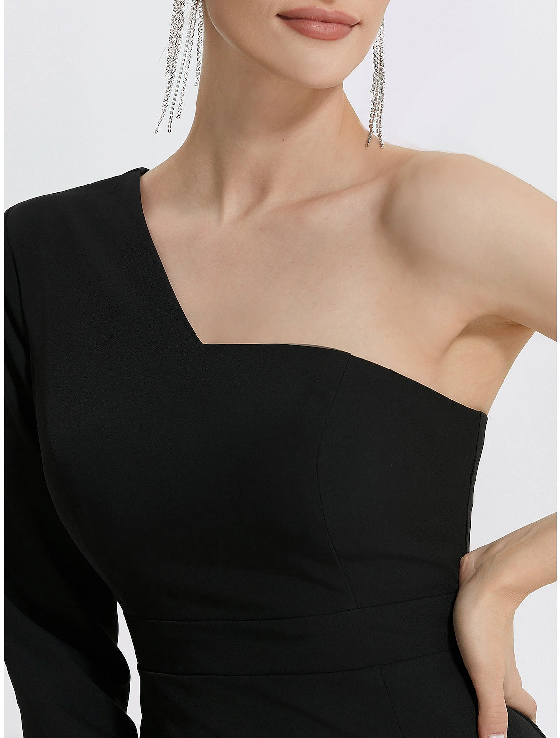 Full view of the Weitese black one-shoulder mermaid evening gown.