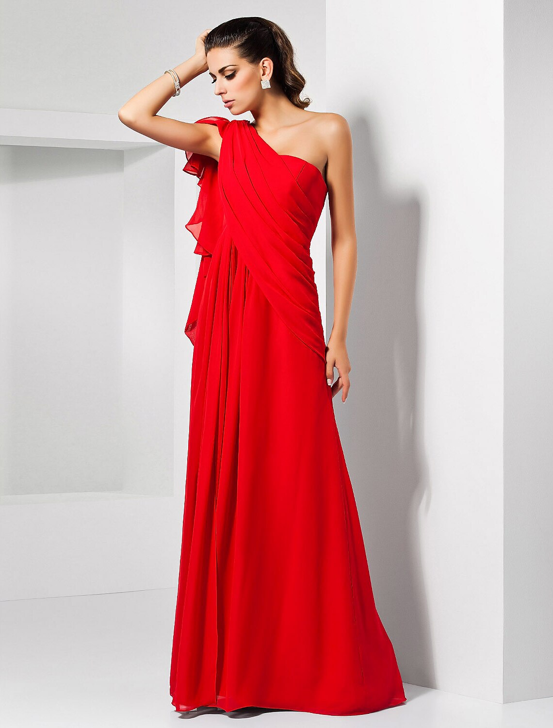 Side view of the floor-length one-shoulder dress, highlighting the slit.
