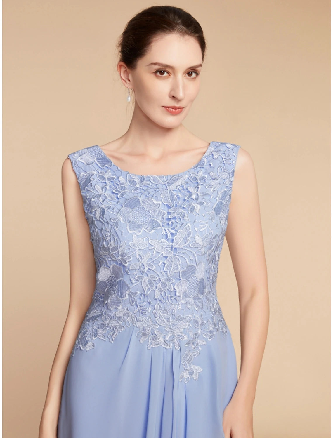Woman in petite two-piece dress, showcasing the knee-length silhouette.
