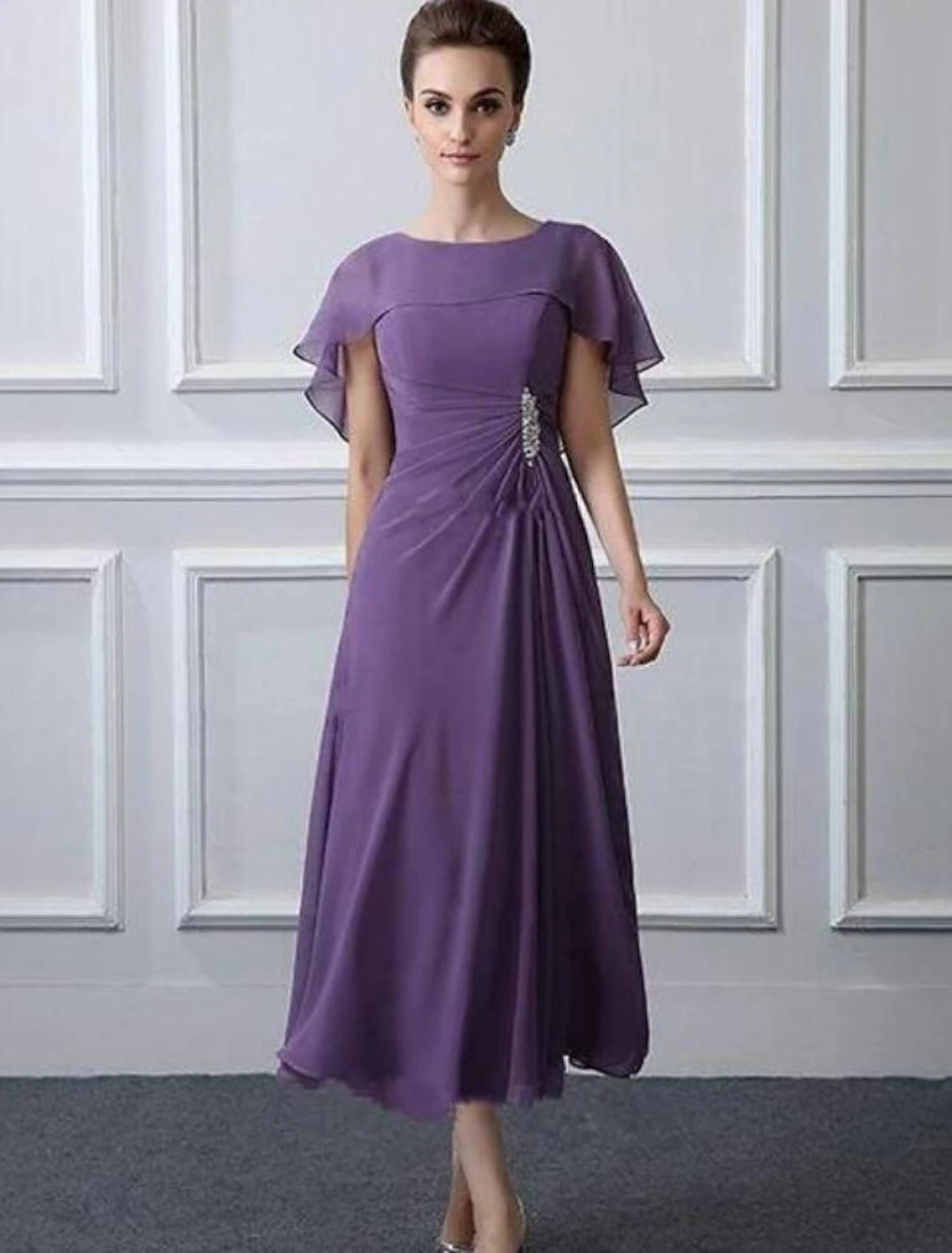Elegant A-Line Mother of the Bride Dress with bateau neck and short sleeves.