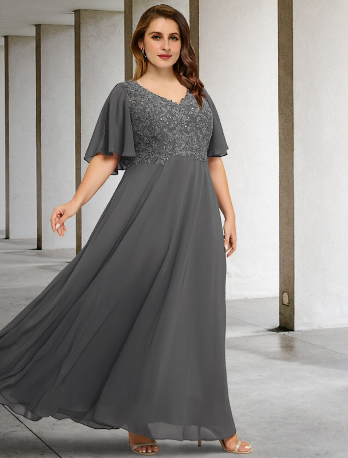 Plus size A-line chiffon mother of the bride dress with short sleeves and V-neck.