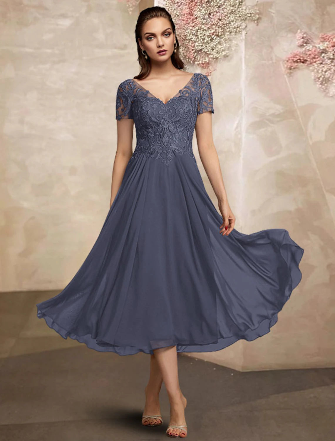 Elegant plus size A-line V-neck tea length Mother of the Bride dress with short sleeves and lace appliques.