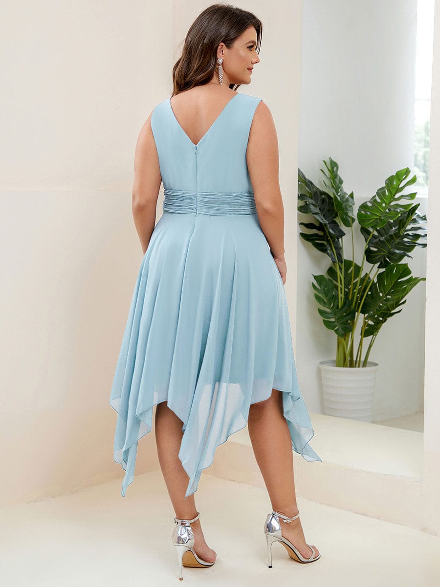 Model in a blue Weitese plus size double V-neck ruched-waist midi chiffon bridesmaid dress, side profile.
