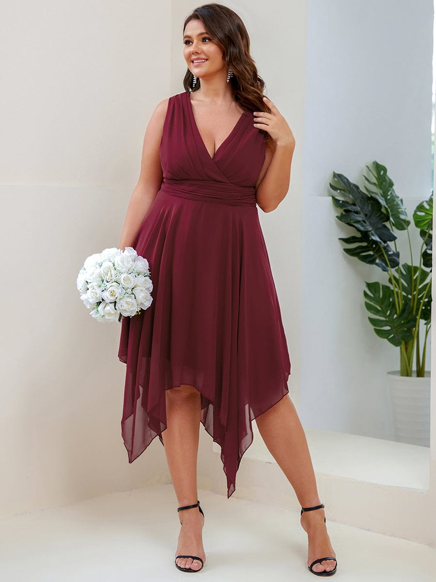 Model in a burgundy Weitese plus size double V-neck ruched-waist midi chiffon bridesmaid dress.