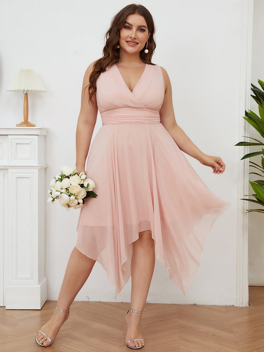 Model wearing a pink Weitese plus size double V-neck ruched-waist midi chiffon bridesmaid dress.
