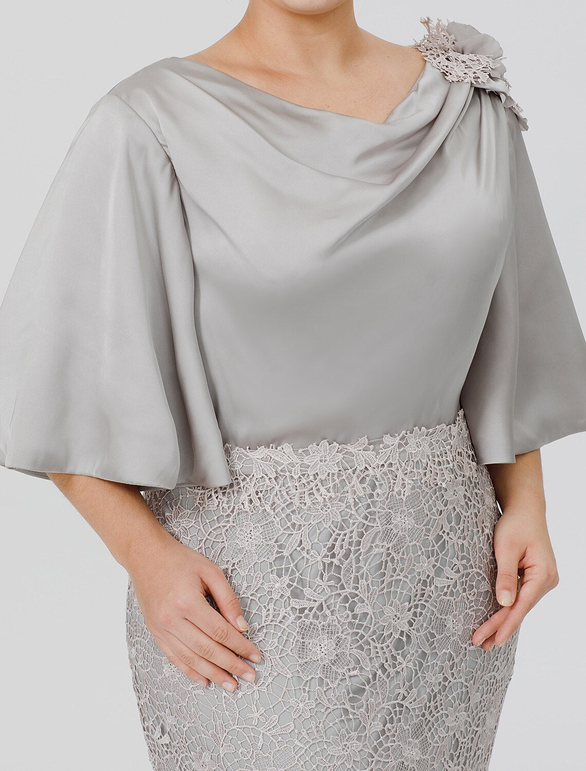 Detail of the lace and applique embellishments on the mermaid trumpet dress.