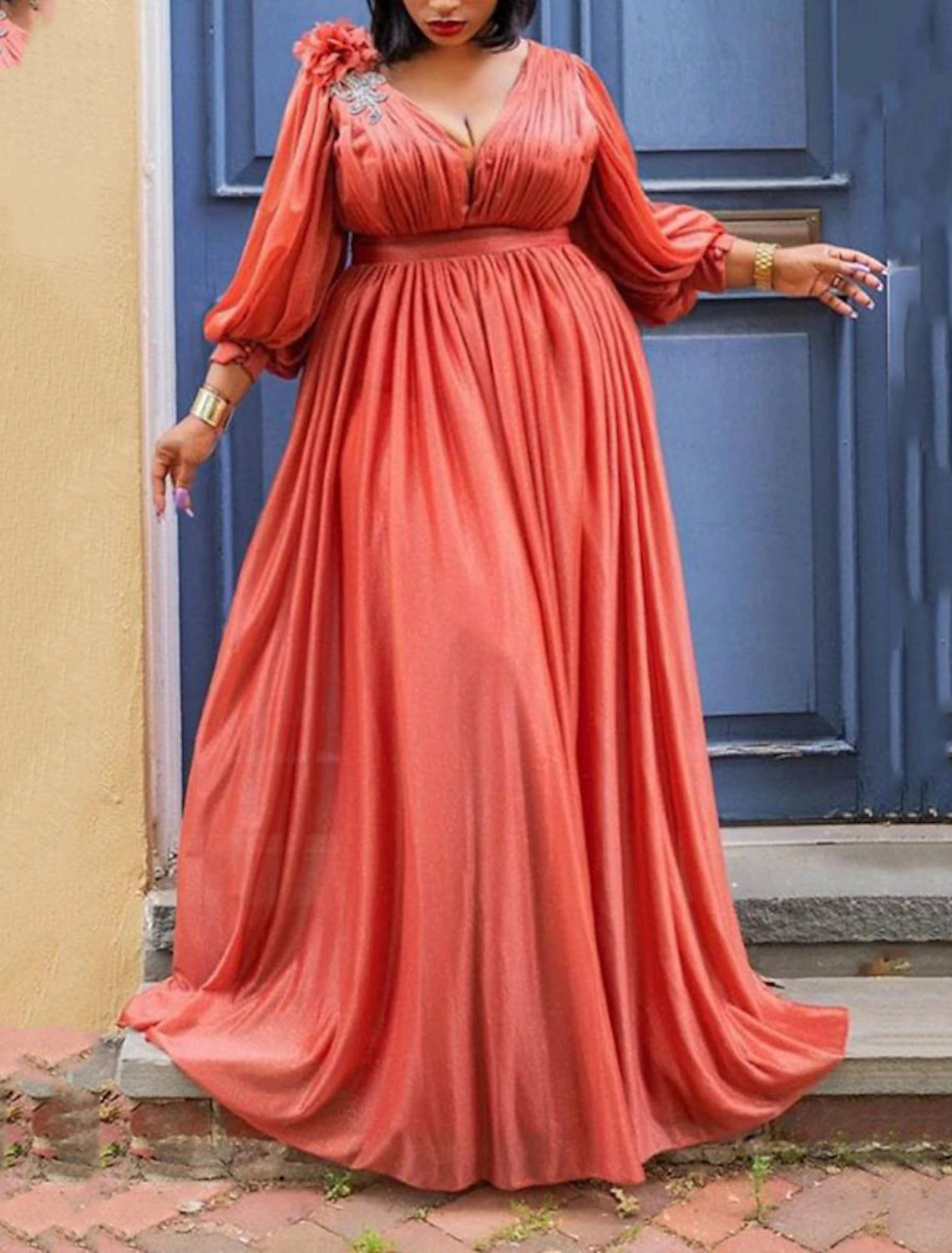 Woman wearing an elegant plus size V-neck ruched maxi dress in solid color.