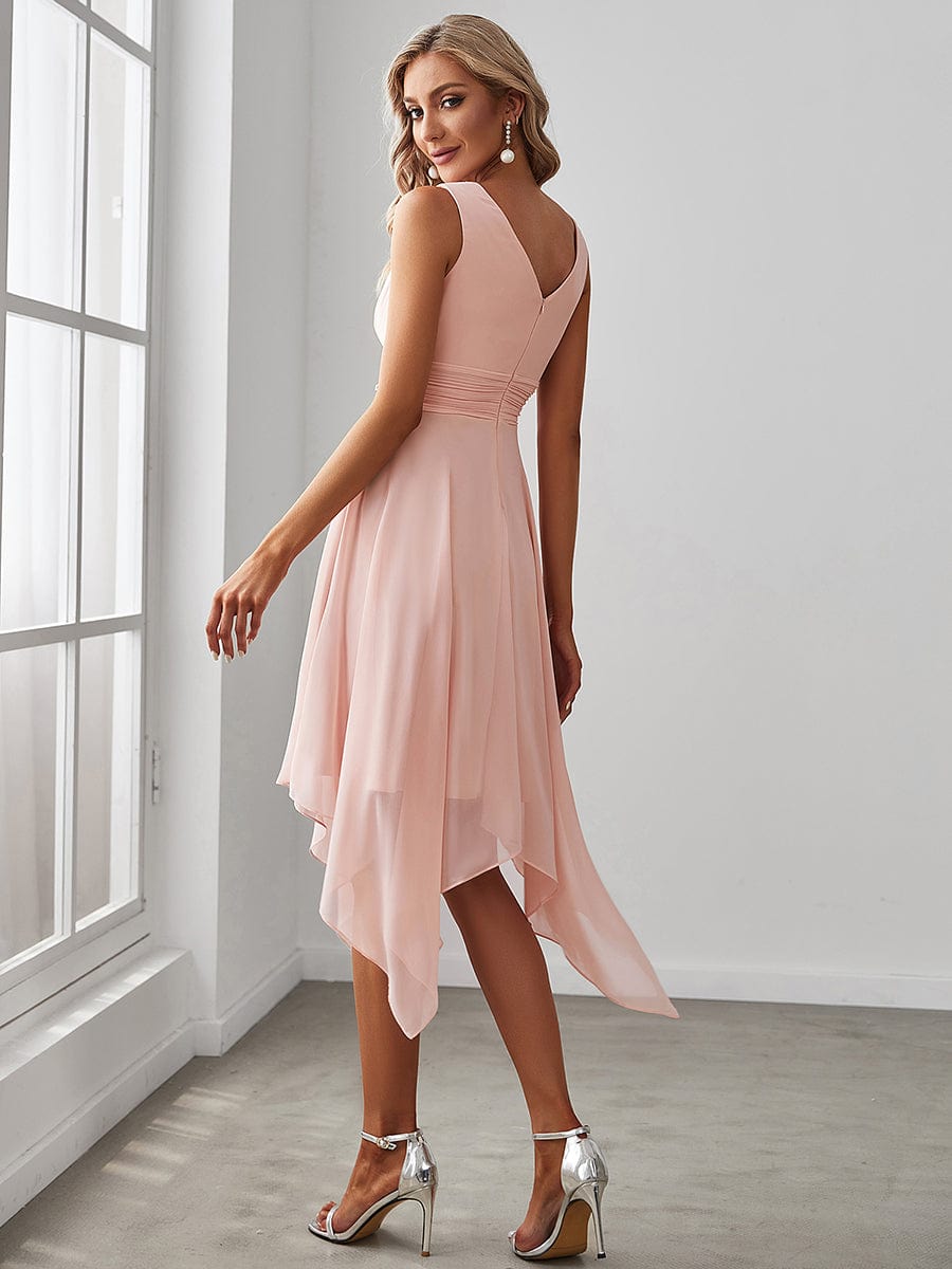 Side view of Weitese pink V-neck ruched chiffon midi dress with asymmetrical hem.