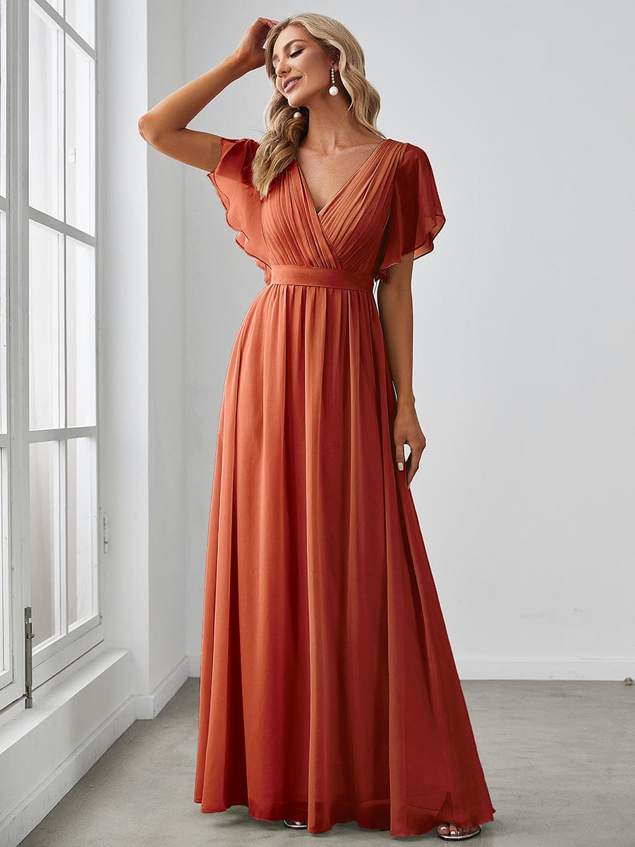 Back view of red Weitese ruffle sleeve evening dress.
