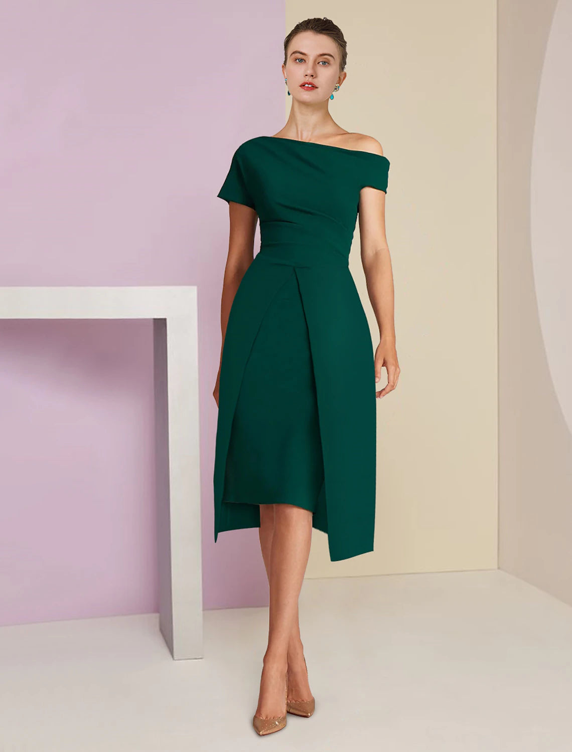 Model wearing an elegant sequined one-shoulder A-line tea-length dress.
