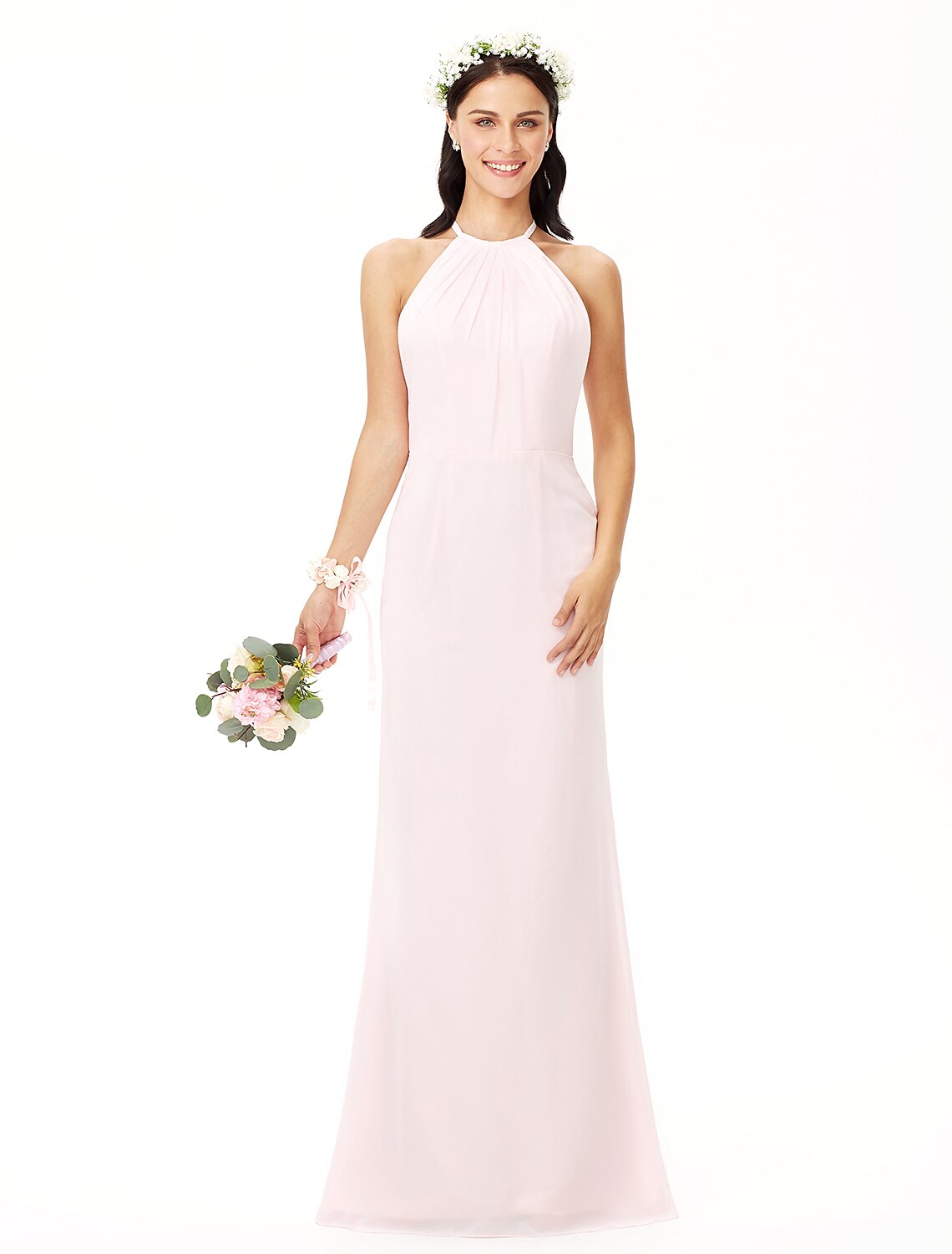Woman wearing a sleeveless jewel neck pleated chiffon sheath bridesmaid dress.