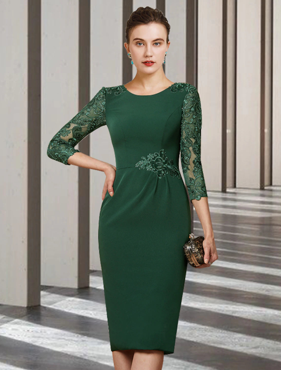 Woman wearing an elegant short sheath mother of the bride dress with jewel neck and long lace sleeves.