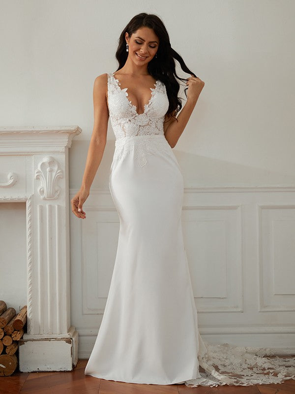 Elegant sheath column lace V-neck sleeveless wedding dress with sweep train.