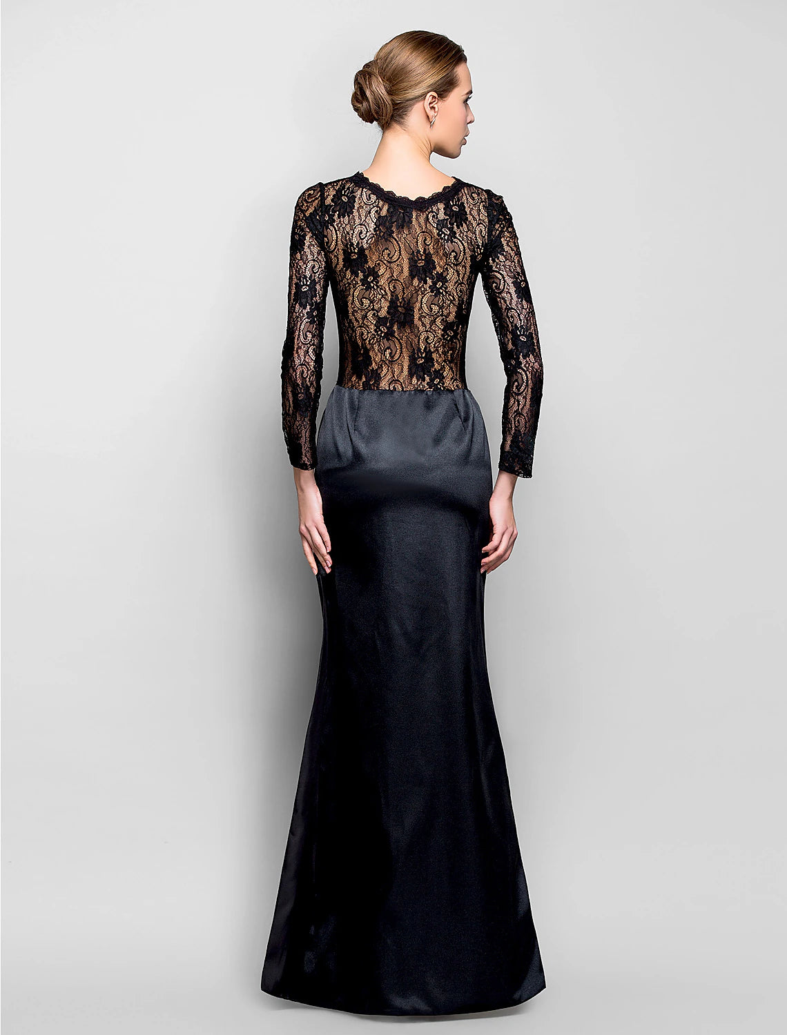 Side view of the elegant Weitese formal gown, highlighting the floor-length silhouette.