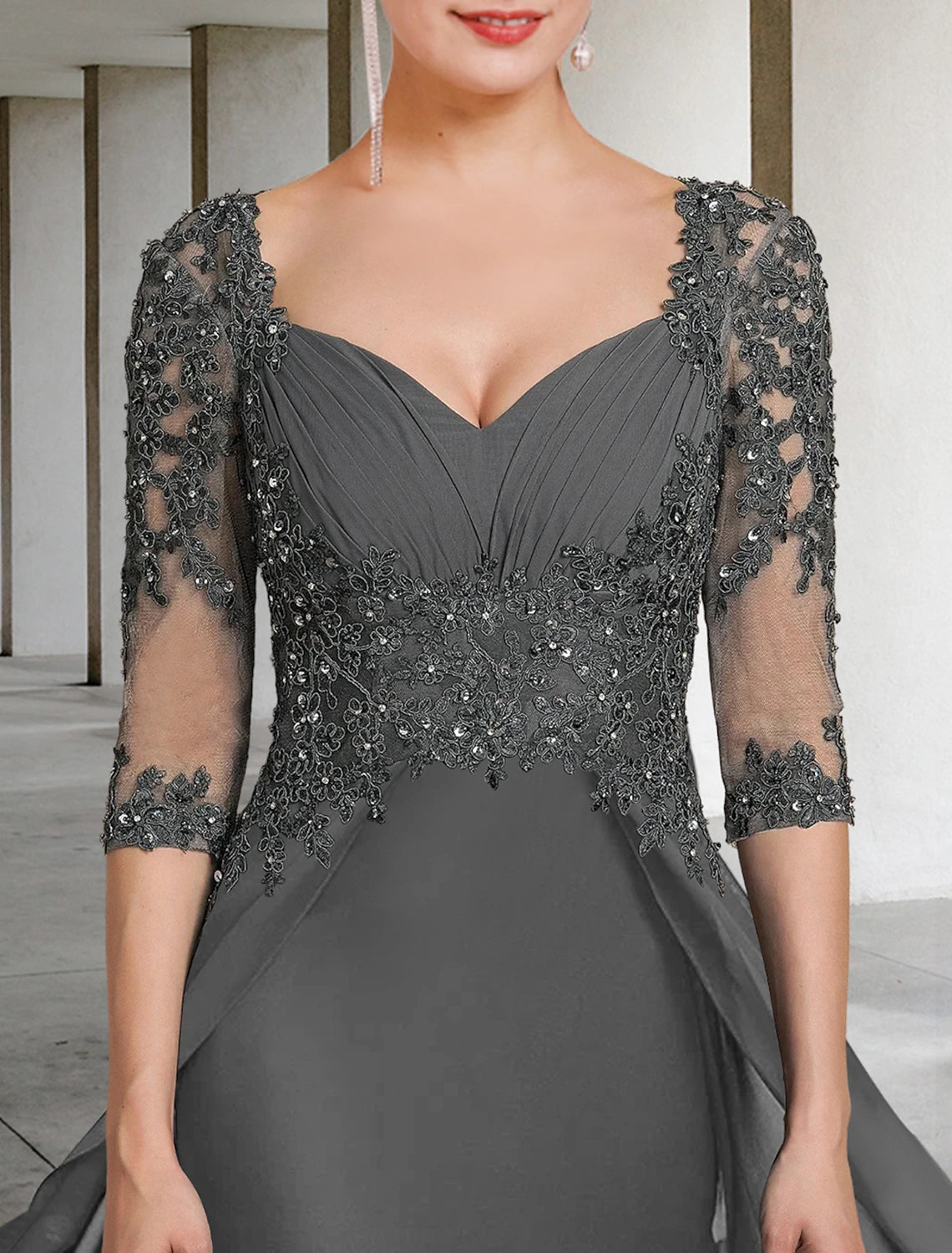 Back view of the floor-length Weitese Mother of the Bride dress with sequin appliques.