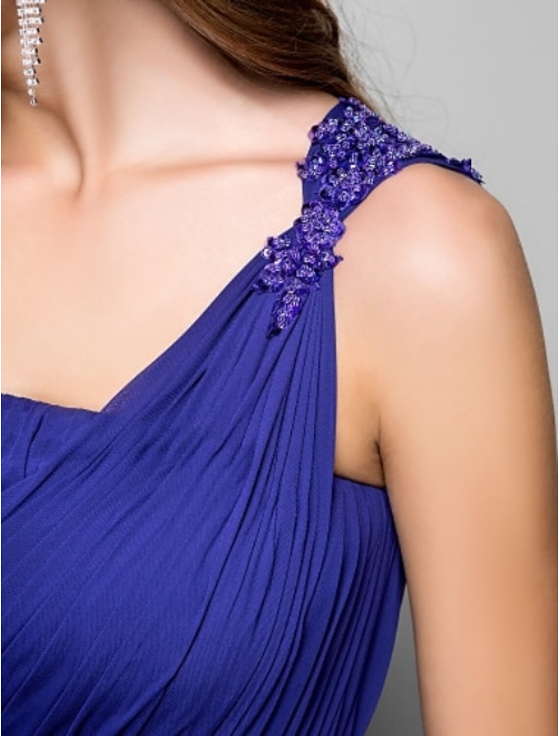 Full-length view of the formal dress, showcasing its floor-length design.
