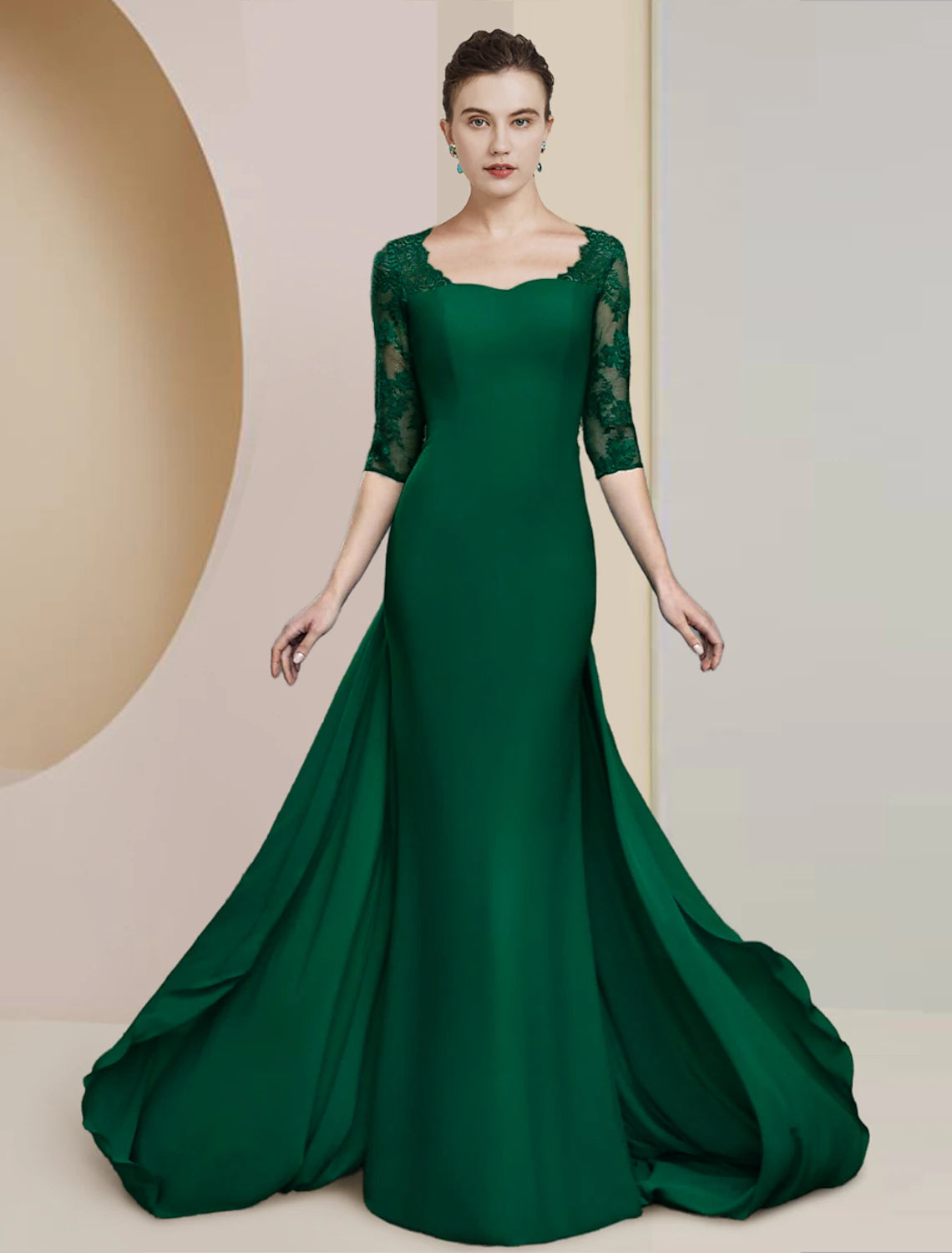 A woman wearing an elegant Sheath Column Mother of the Bride dress with a scoop neck and half sleeves.
