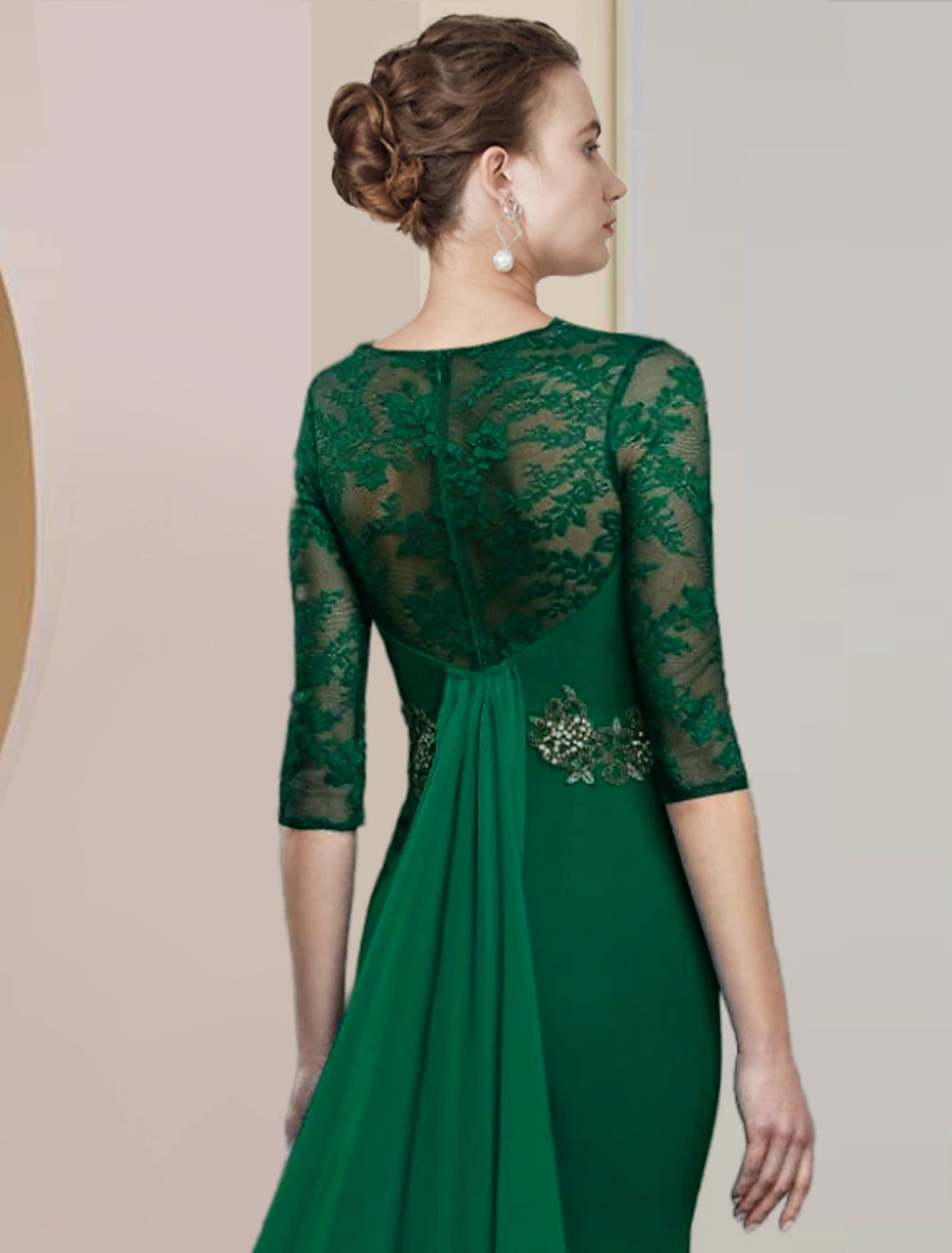 Close-up of the chiffon lace fabric and applique details on the Mother of the Bride dress.