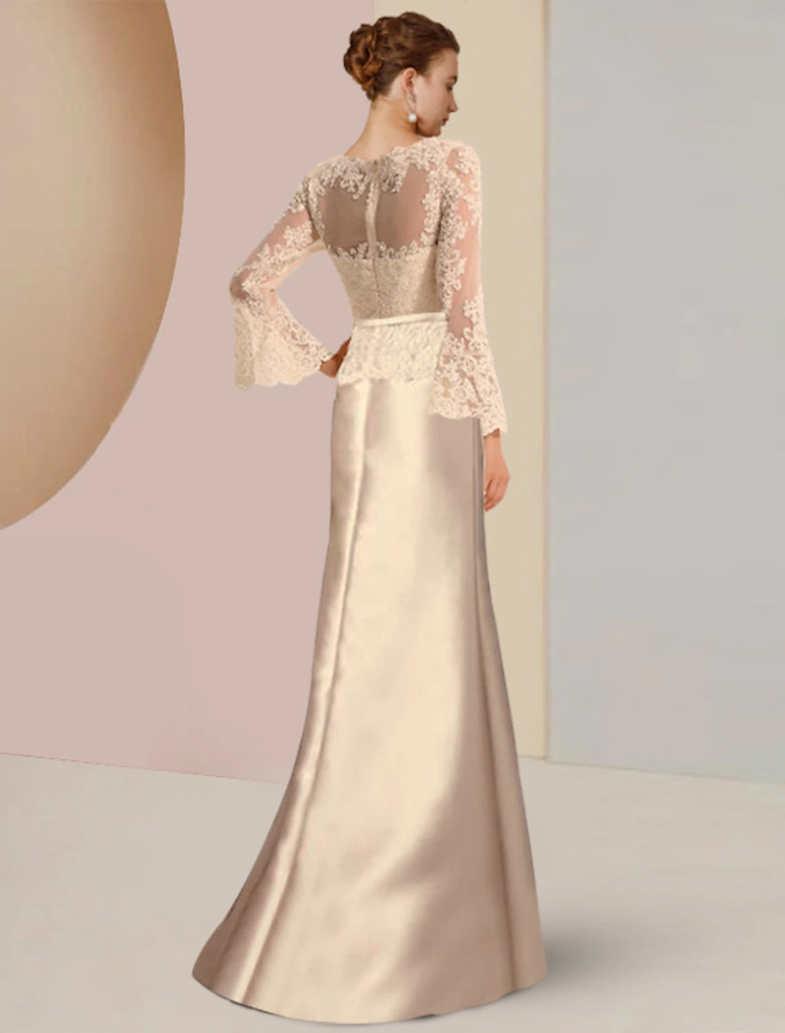Side view of a woman in a Weitese satin lace mother of the bride dress, showcasing the sweep train and beading.