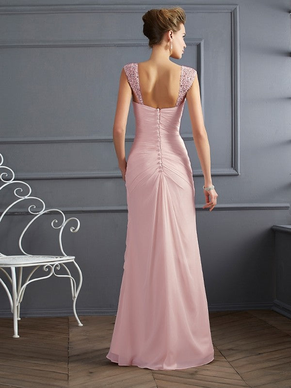 Full length view of the elegant sheath column dress.