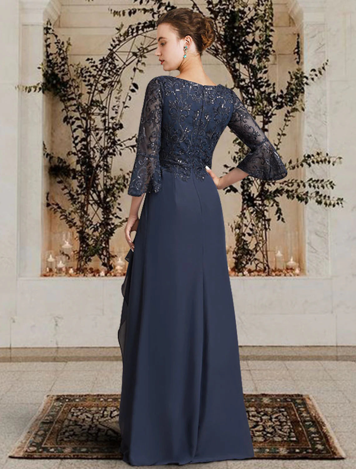 Full length view of the Weitese sheath Mother of the Bride dress, highlighting the chiffon lace and pleats.