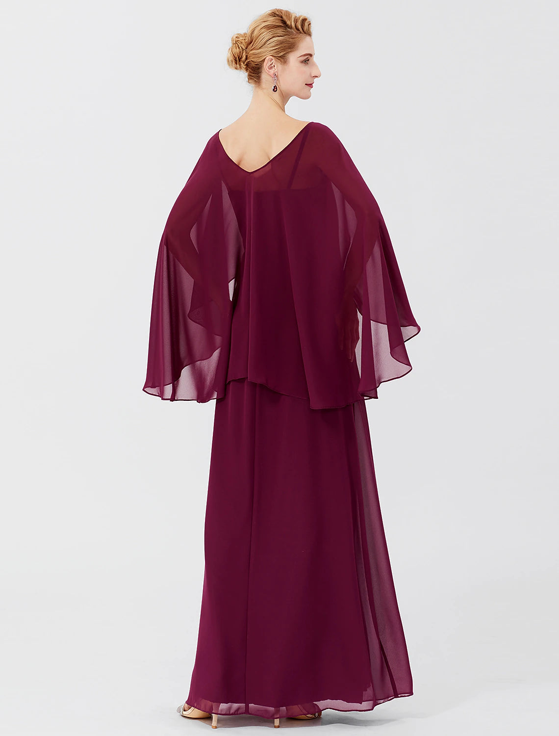 Full view of the chiffon Mother of the Bride gown with pleats and beading.