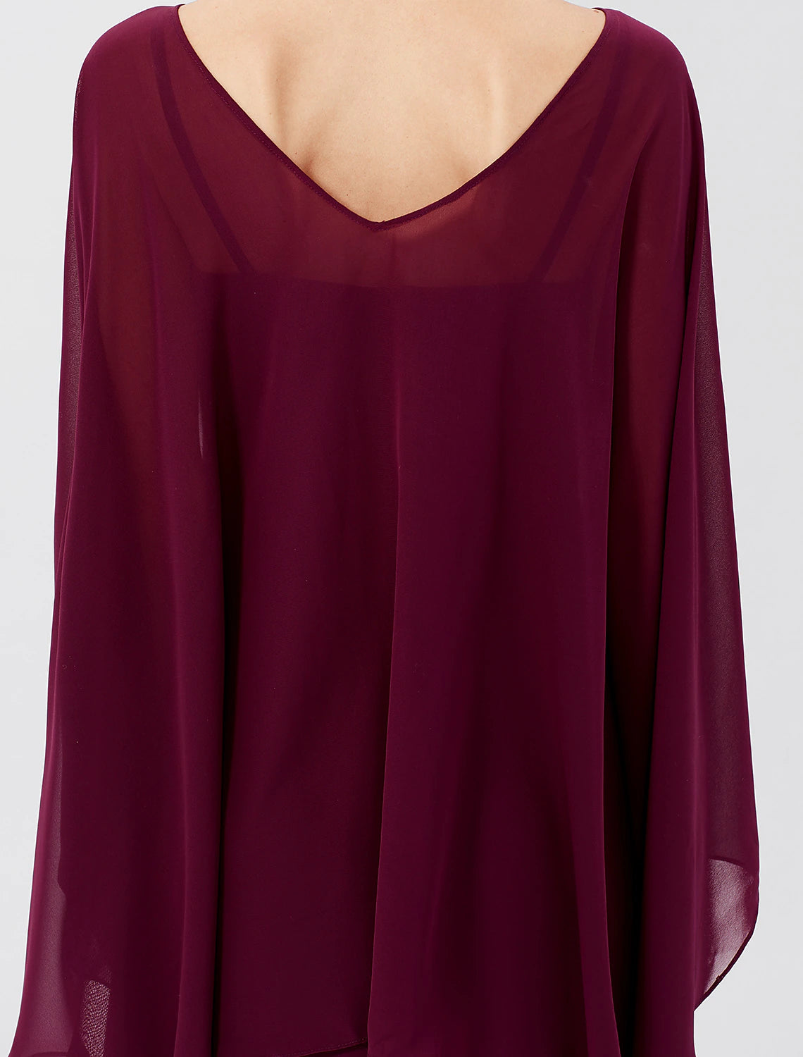 Side profile of the elegant Weitese formal dress, showing chiffon flow.