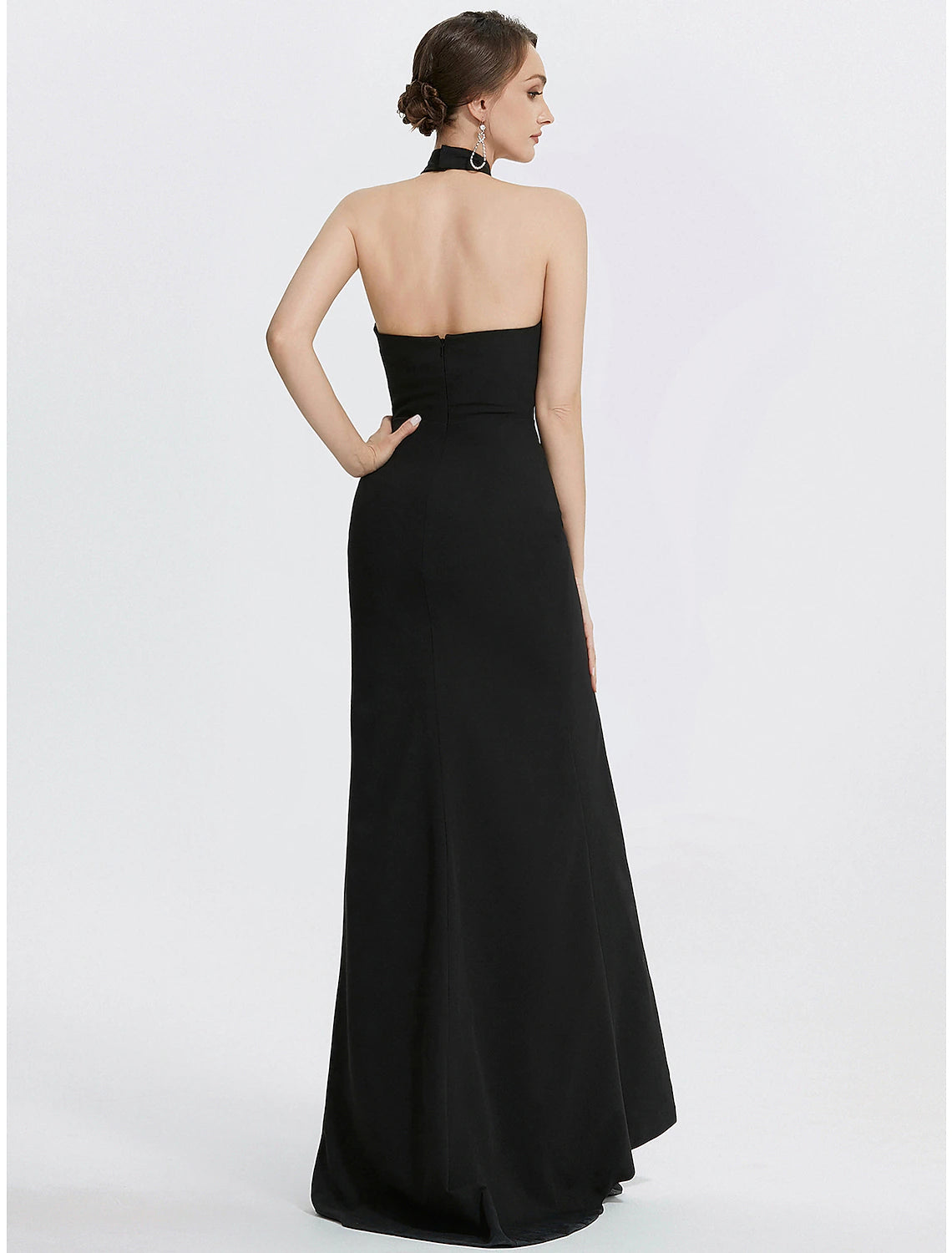 Back view of model showcasing the Weitese black halter neck ruched sheath gown.