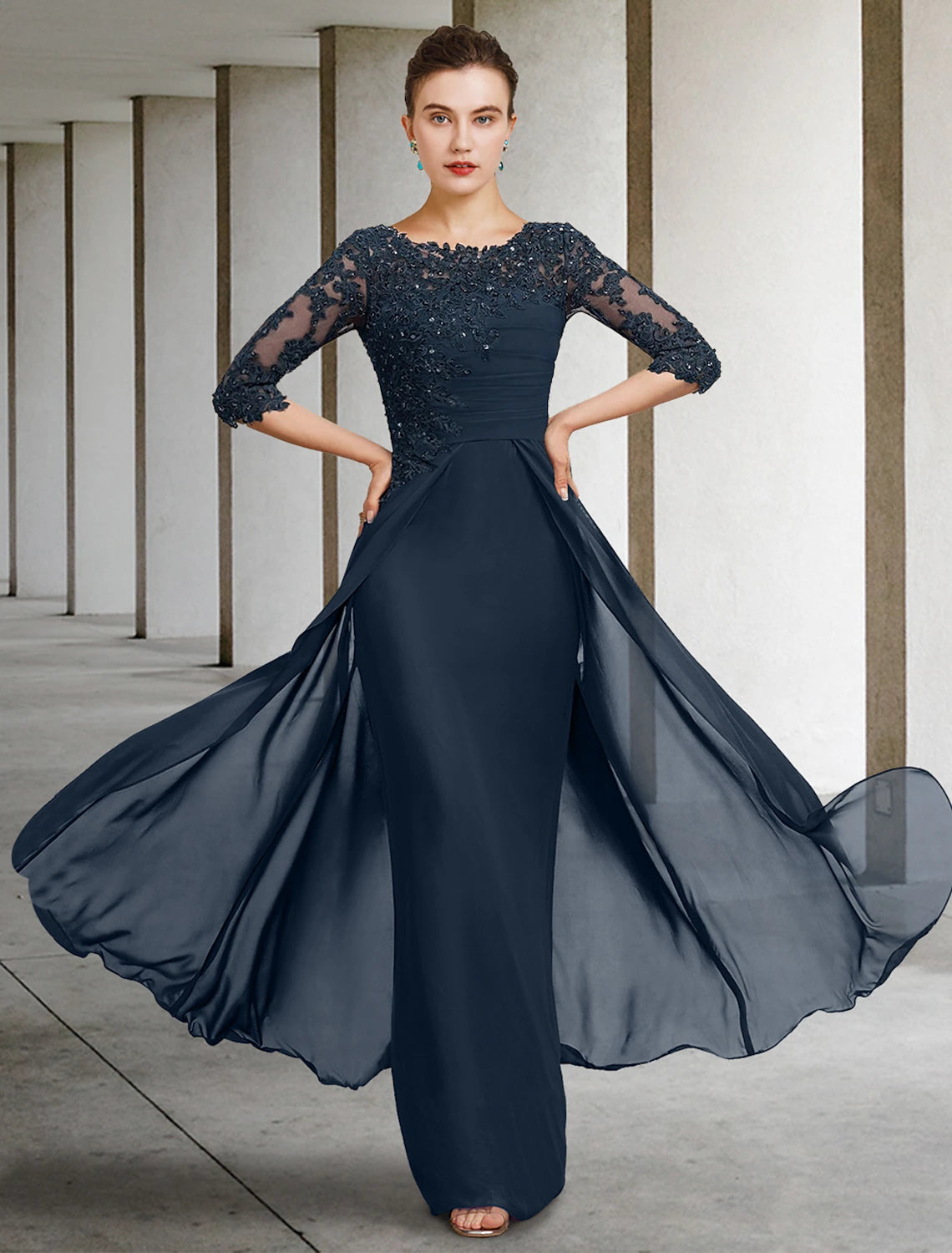 Elegant light purple sheath dress with jewel neck and half sleeves.