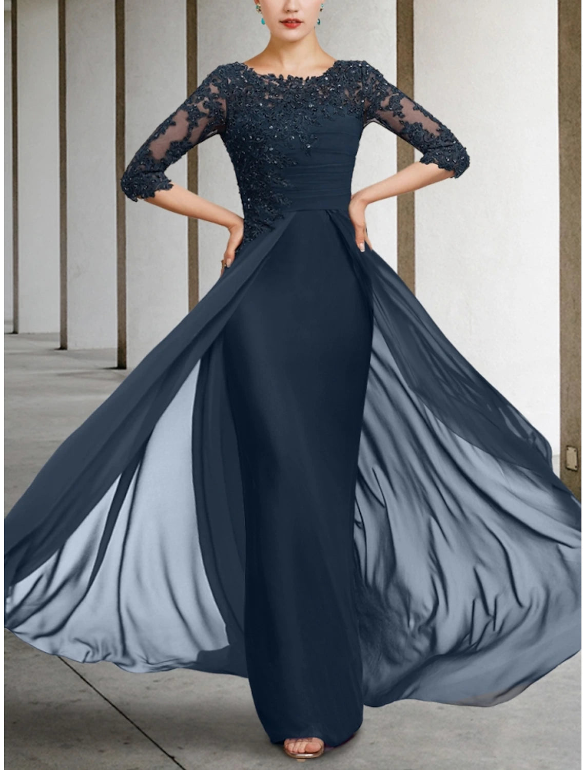 Back view of the elegant gown featuring sequin ruching.