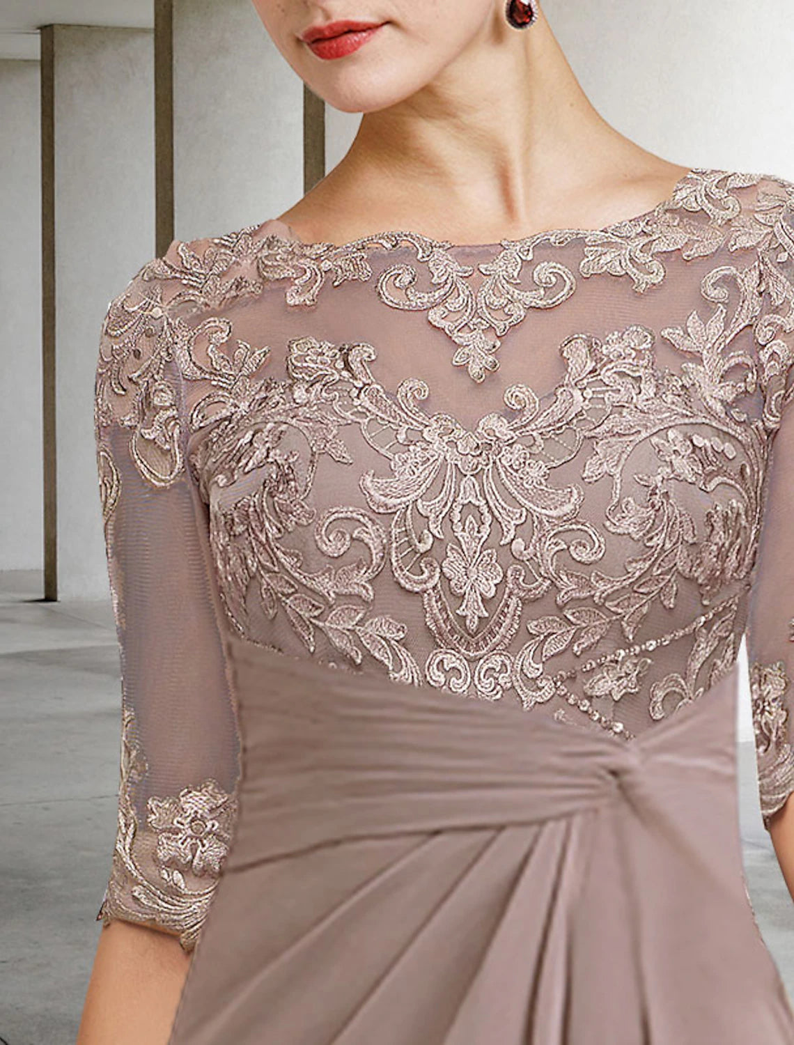 Another view of the elegant blue mother of the bride dress, showcasing its refined design.
