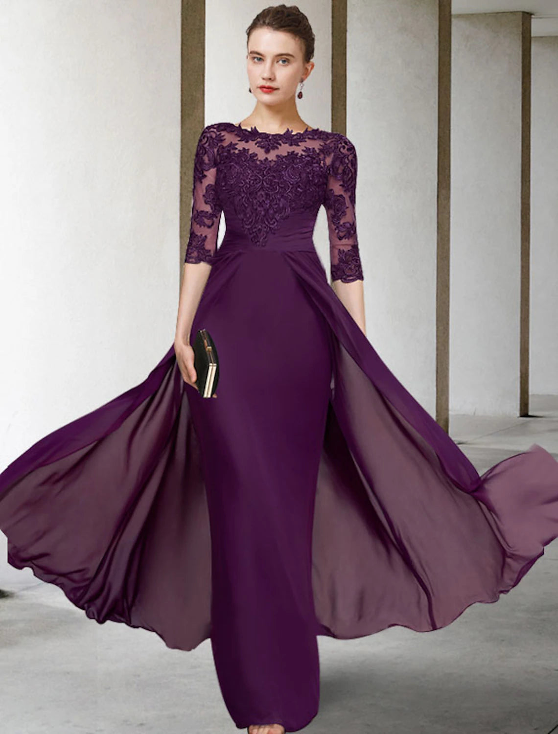 Side profile of the elegant half-sleeve dress.