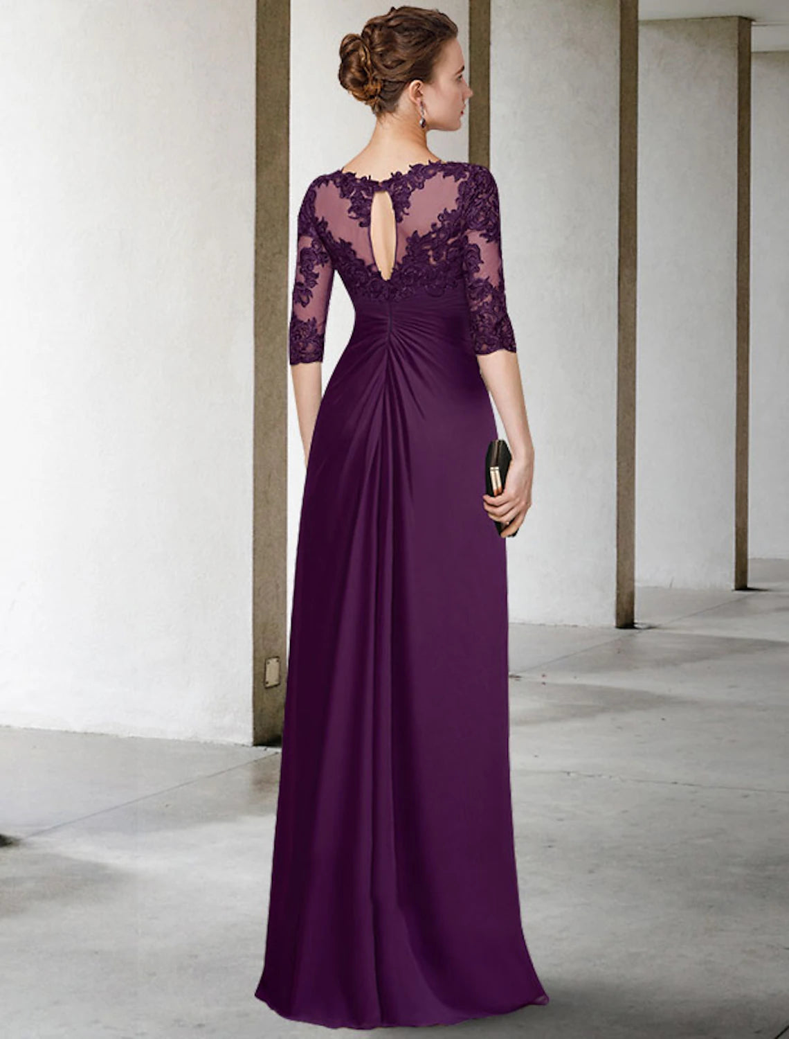 Model wearing the floor-length Mother of the Bride dress.