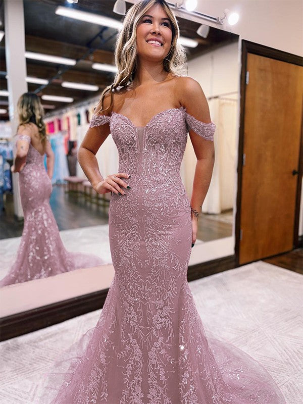 Back view of the sheath prom dress, highlighting the court train and lace details.