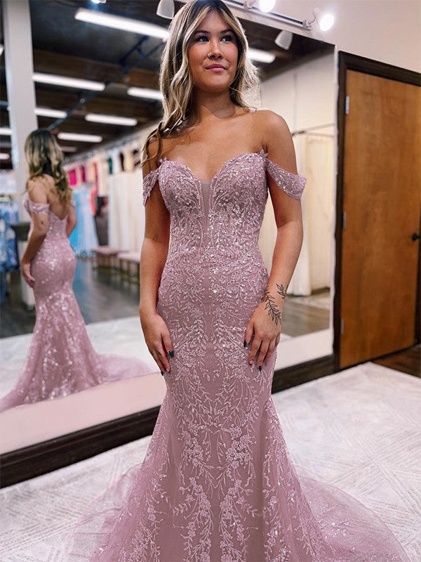 Side view of the elegant off-the-shoulder prom dress, showing the silhouette.