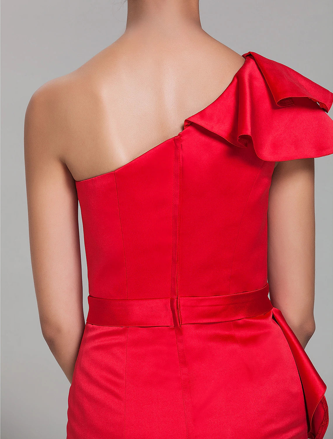 Side view of the Weitese satin mini dress, highlighting the one-shoulder design and sash.